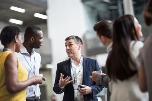 business-executives-meeting-networking-event-600nw-2254412007